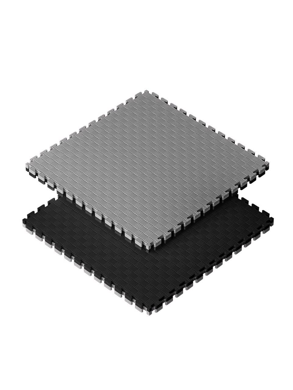 Two interlocking EVA floor tiles in grey and black, shown stacked